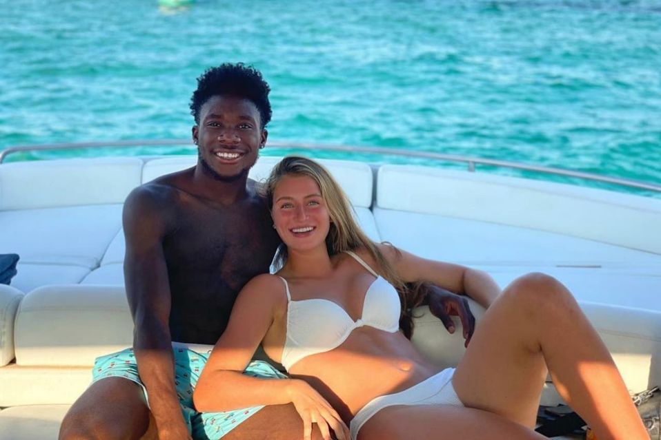Alphonso Davies y Jordyn Huitema